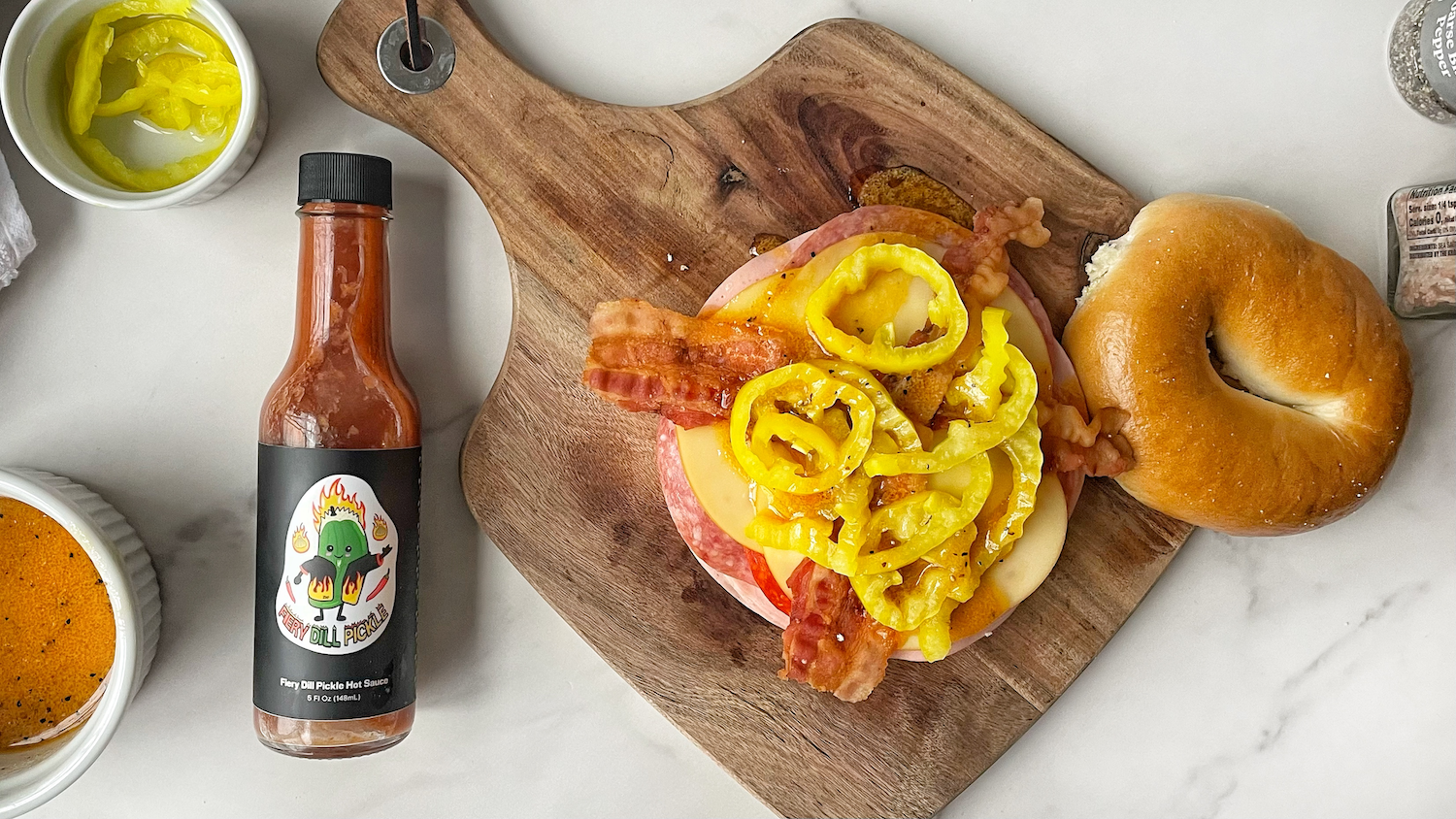 Italian Bagel Sandwich with Fiery Dill Pickle Hot Sauce