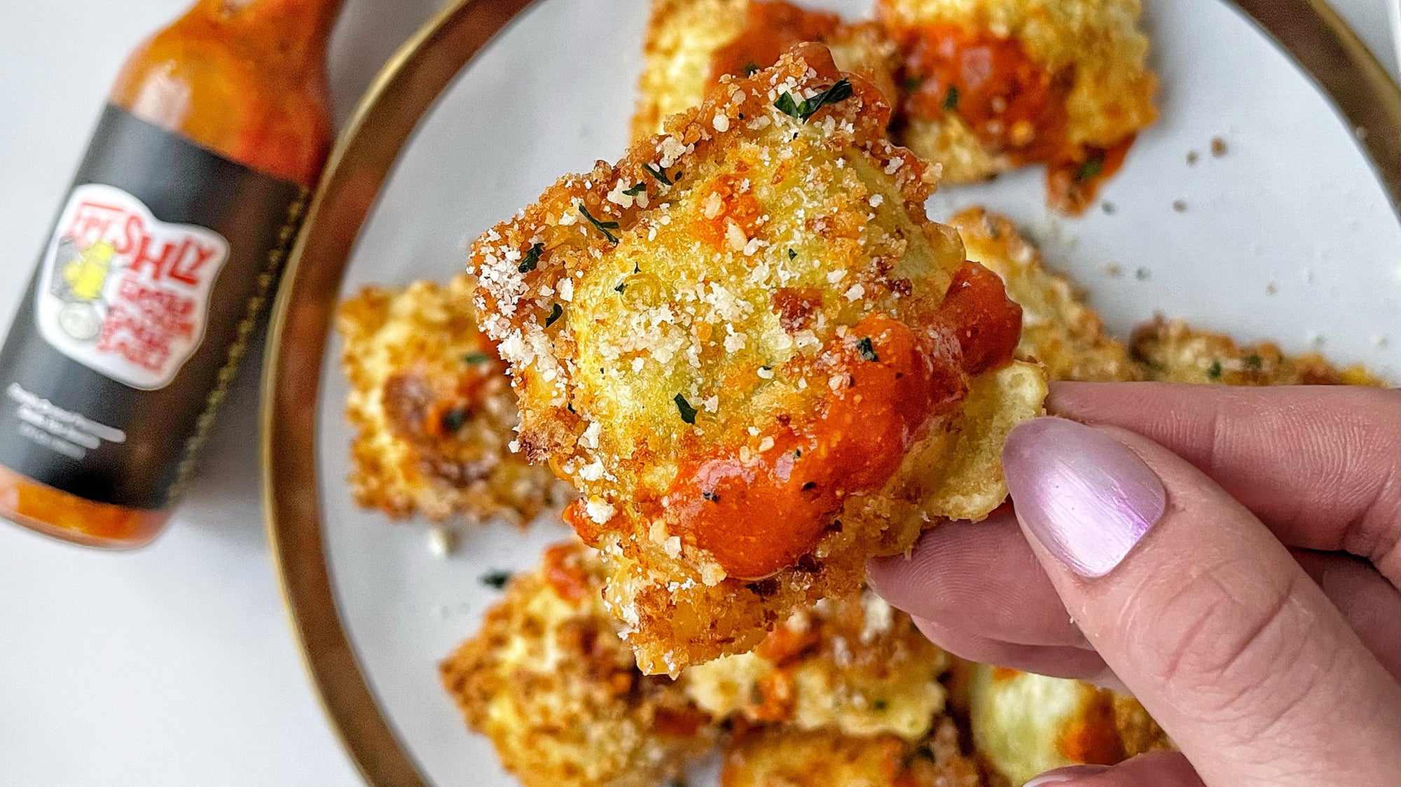 Spicy Fried Ravioli with Freshly Grated Parm Garlic Sauce